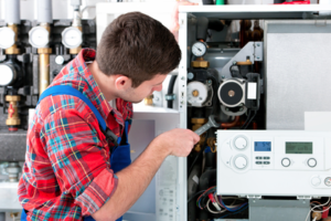 man repairing air conditioning