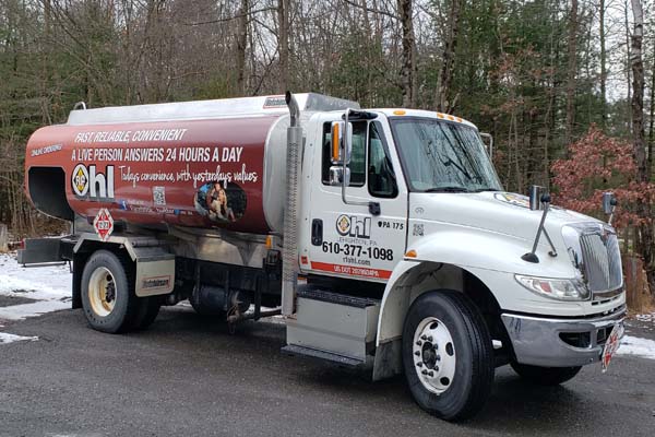 image of a heating oil delivery at a home