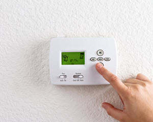 image of Jim Thorpe PA homeowner with programmable thermostat