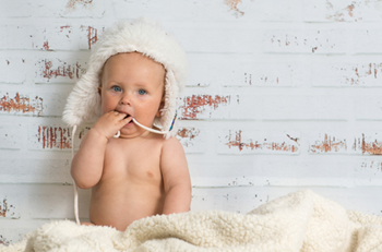 baby enjoying heat in winter