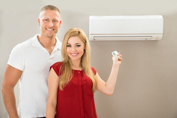 couple with a ductless AC system