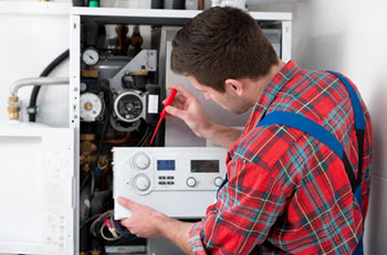 technician performing an HVAC tune-up