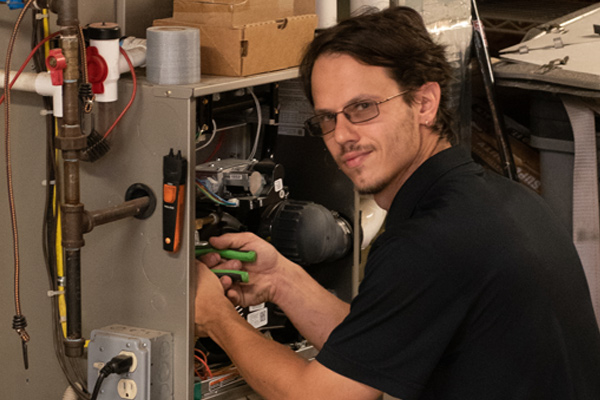 RF Ohl Technician Preforming A Heater Repair