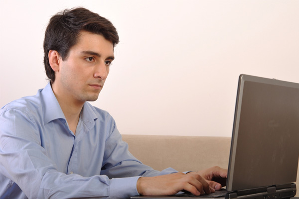 image of homeowner looking at hvac company website