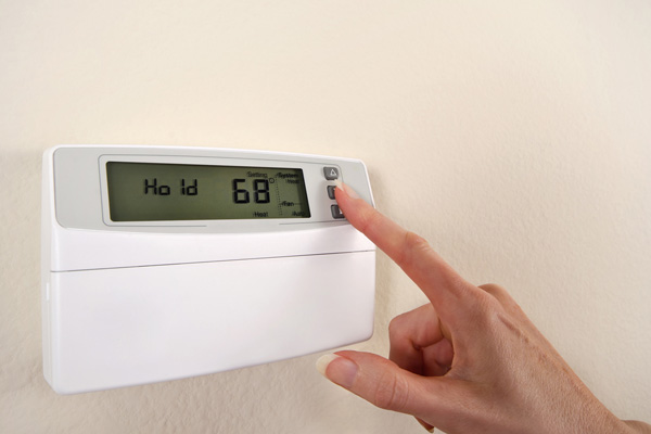 Adjusting and setting thermostat