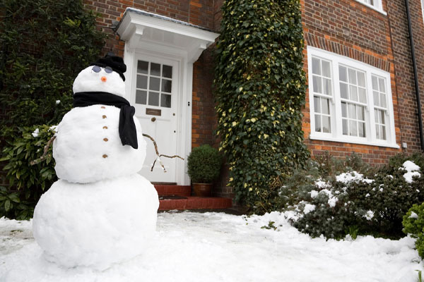 house in winter that uses heating oil