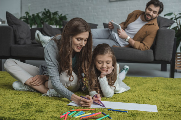 family spending time indoors during winter depicting home comfort and new furnace installation