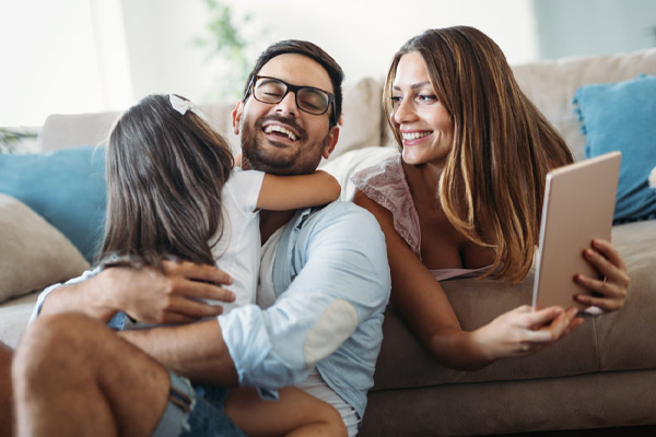 image of a family enjoying comfort of new efficient heating oil system