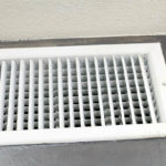 air conditioning vent with ac unit that is blowing smoke