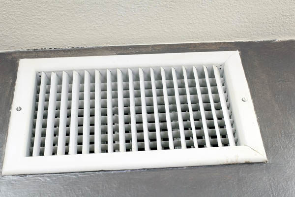 air conditioning vent with ac unit that is blowing smoke