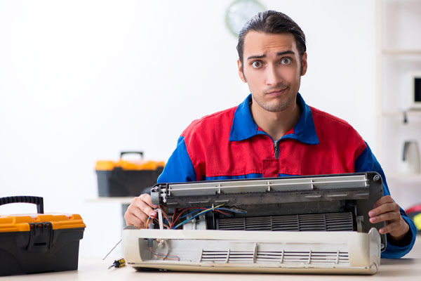 image of a confused hvac contractor performing an hvac installation