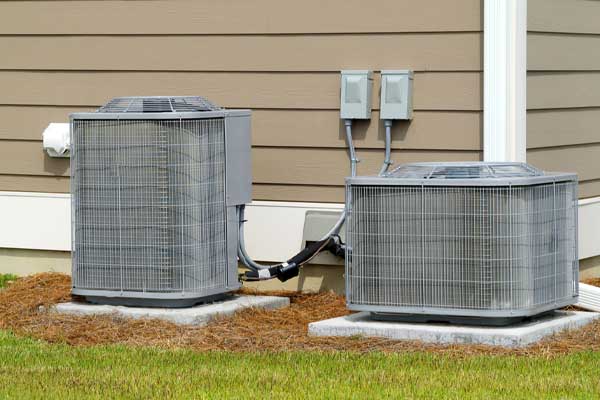 image of an air conditioner compressor depicting ac outdoor unit that is working but not cooling