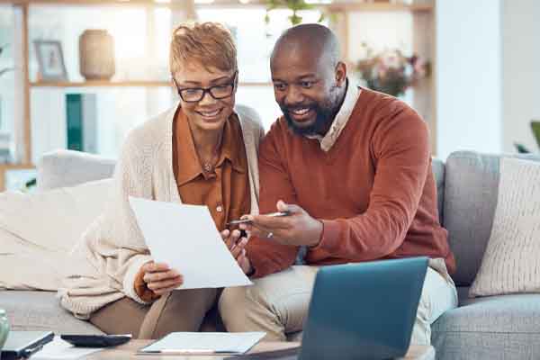 image of a couple saving money due to a furnace installation with a high efficiency afue rating