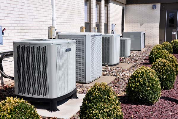 image of an air conditioner and a heat pump