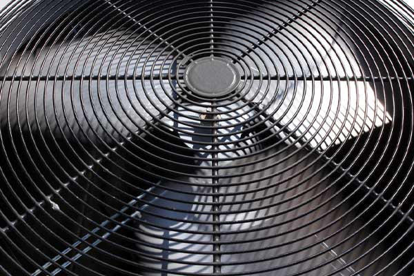 image of an air conditoner fan in the outdoor unit