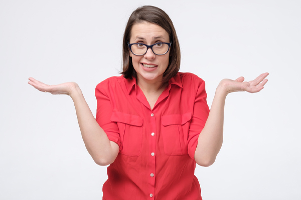 image of confused homeowner about air conditioner life expectancy