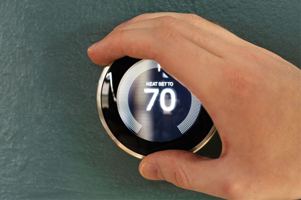 image of a wi-fi thermostat for home heating oil heating systems