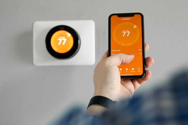 image of remote thermostat control and wi-fi thermostat for oil heating system