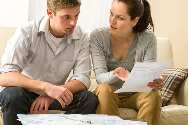 couple worried about expensive energy costs